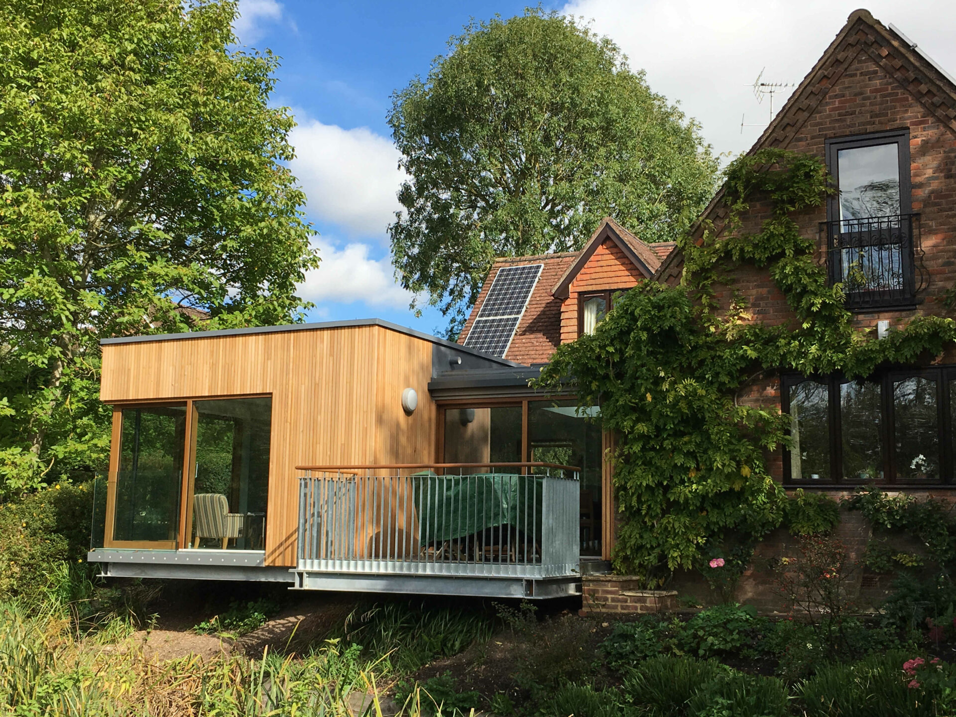Contemporary waterside lodge with extension where Clegg Associates organised the build.